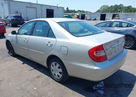 2004 Toyota Camry Le z USA, uszkodzony, nr VIN 4T1BE32K74U803215